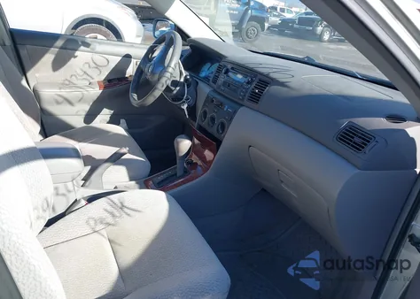 2003 Toyota Corolla Le z USA, uszkodzony, nr VIN JTDBR32E832005254